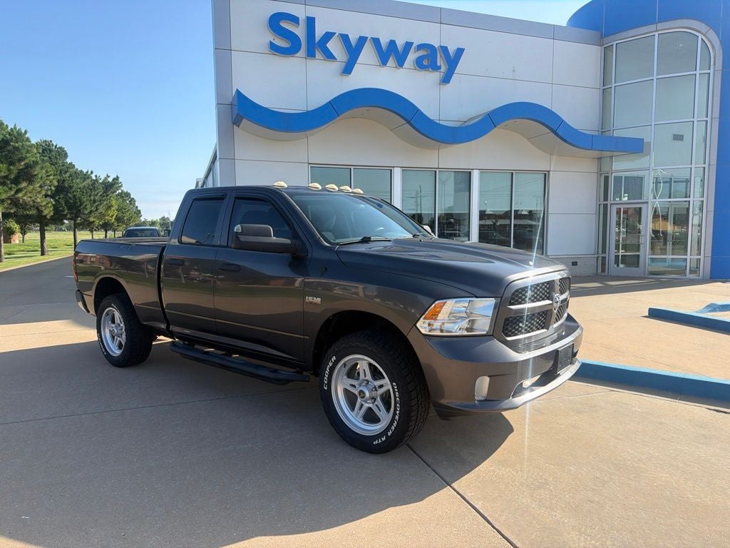 2014 RAM 1500 Express in Granite Crystal Metallic Clearcoat — front three-quarter view