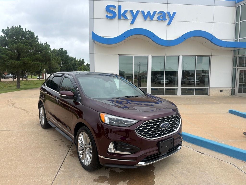 2020 Ford Edge Titanium in Burgundy — front three-quarter view