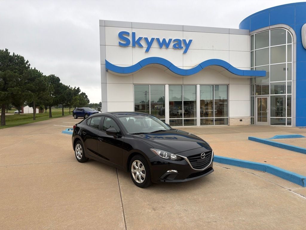2016 Mazda Mazda3 i Sport in Jet Black Mica — front three-quarter view